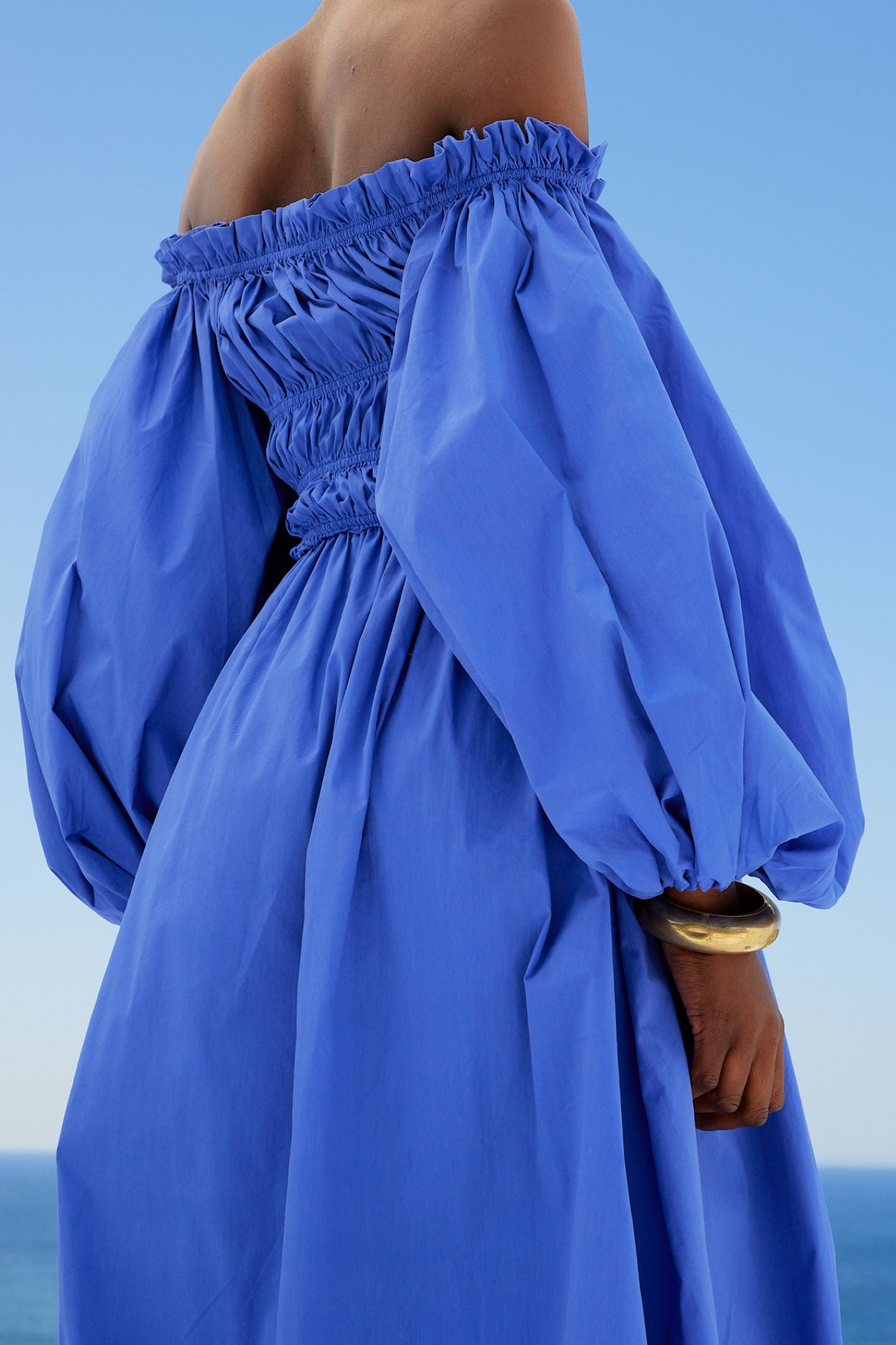 RAQUELA OFF SHOULDER RUFFLE MAXI DRESS