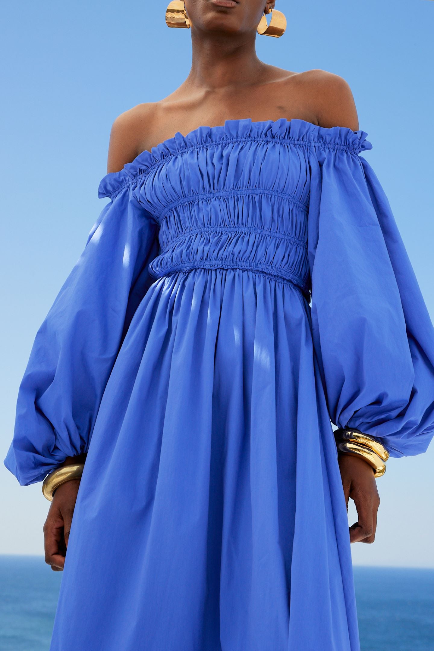 RAQUELA OFF SHOULDER RUFFLE MAXI DRESS