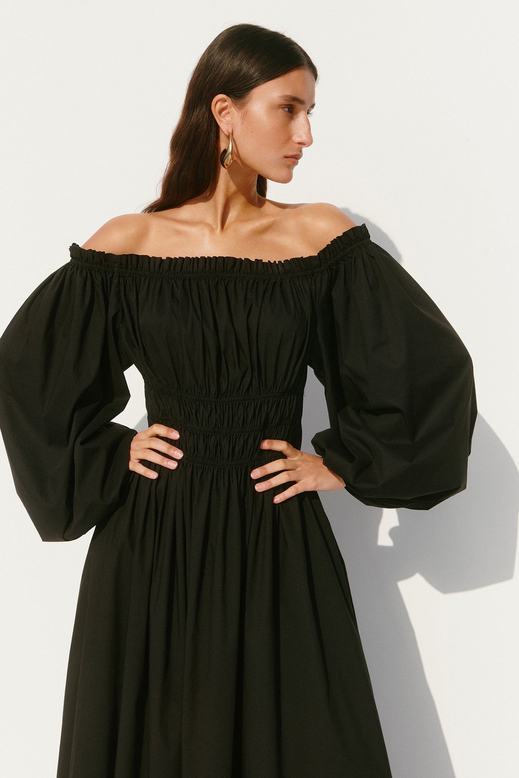 RAQUELA OFF THE SHOULDER RUFFLE MAXI DRESS